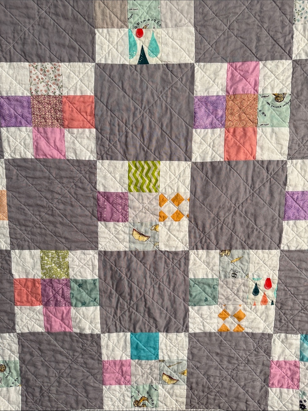 Handmade Patchwork Quilt with Pink, Purple, Green and Coral Accents